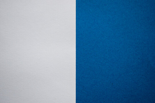 White and blue abstract background divided vertically