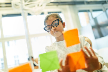 Girl as a businesswoman brainstorming