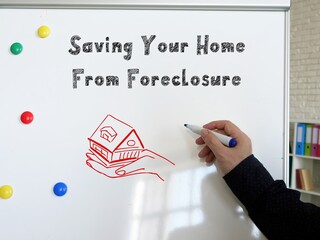 Business concept meaning Saving Your Home From Foreclosure with sign on the sheet.