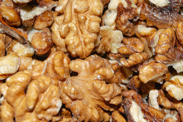 Peeled walnuts close-up. Surface texture. Healthy diet.