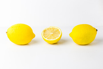 Composition of fresh lemons isolated on a white background
