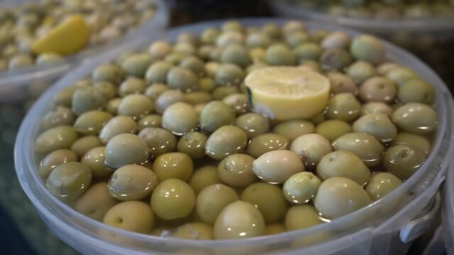 Olives in Oil and Lemon on Display in Bazaar Shop in Iraqi Kurdistan, Close Up