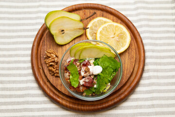 Pears and bacon salad for a healthy and fresh meal. Very tasty and very easy to cook. Add nuts and seeds and some sour cream with lemon juice for a great taste.