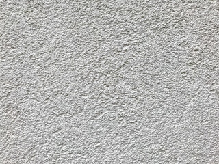 Small Sandstone from texture of sand wall or background of sand wall. White clean background, surface looks rough. Wallpaper shape. Gray print element. Space for text or logo