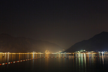 The lights of the night-time Kotor Bay in Montenegro.