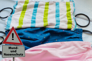 Achtungsschild Mund- und Nasenschutz