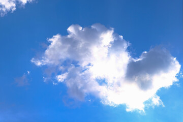 Naklejka na ściany i meble Fluffy Cloud in the blue sky