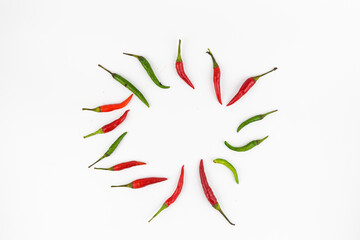 Red and green hot chili peppers isolated on white background