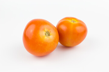 Fresh tomatoes isolated on a white background