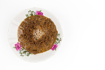 Peanut sauce or Kuah Kacang isolated on white background