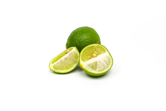 Fresh Key Limes Or Limau Nipis On White Background. 