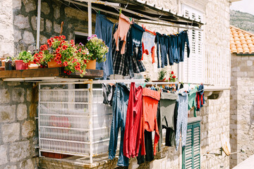 Clothes are dried on a balcony in the old town of Dubrovnik, Croatia.