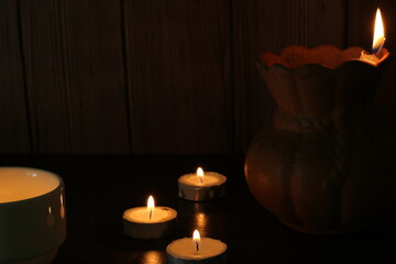 candles that are lit in the dark