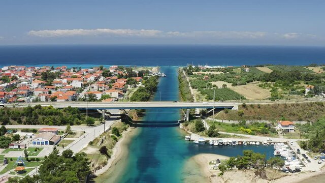 Aerial view of strait with bridge road at Potidea town, Greece.