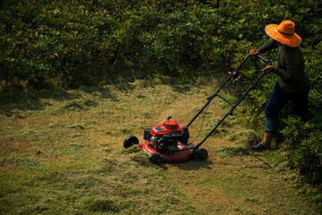 man mowing lawn