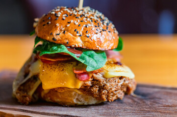 Close up tasty burger with minced meat served on tray
