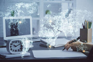 Social network theme hologram over woman's hands writing background. Concept of international...