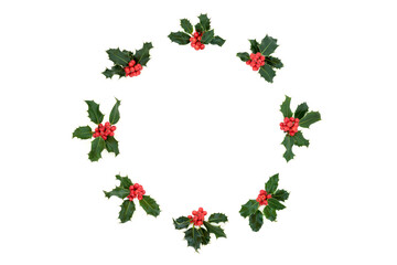 Winter, Christmas & New Year natural holly berry wreath composition on white background. Flat lay...