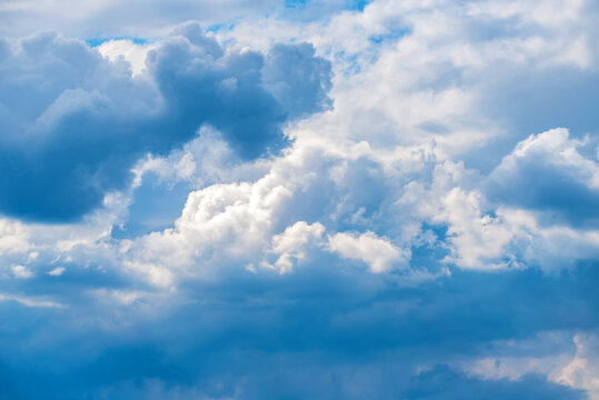 Heavenly blue sky with white clouds background