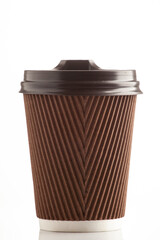 Paper brown corrugated cup on a white background with a lid. A glass for hot drinks. Takeaway drinks.