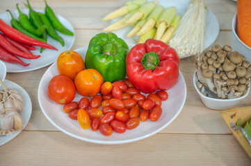 Fresh vegetable and fruit on wooden table in kitchen