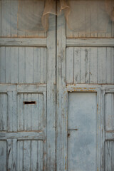 light blue wooden old door detail vertical