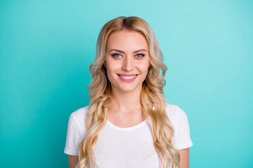 Portrait of pretty toothy smile satisfied candid woman look in camera enjoy rest relax wear casual style clothes isolated over green teal color background