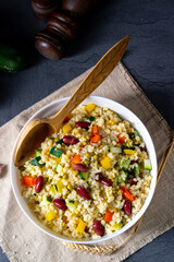 bulgur kaszotto with fresh vegetables and kidney bean