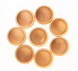 set of wooden bowls on a white background