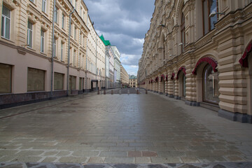 Naklejka na ściany i meble Pedestrian street without people, quarantined during Covid-19