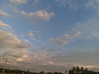 Blue sky background with white clouds