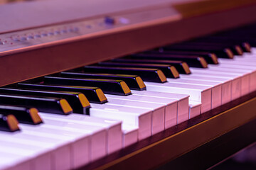 Piano keys on a beautiful colored background.