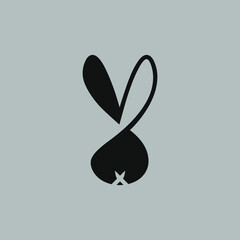 Abstract bunny head symbol on gray backdrop. Design element