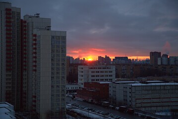 Sunset through high-rise buildings, urban development