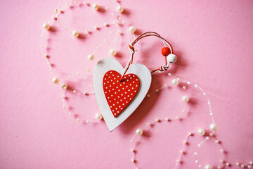 Decorative heart on a pink background. Heart.