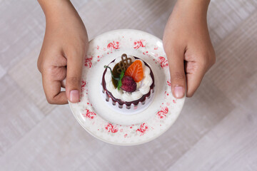 woman hands holding a bowl of eggs