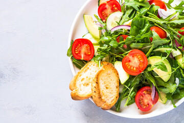 Green salad from leaves and vegetables.