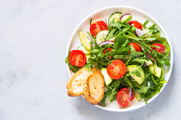 Green salad from leaves and vegetables.