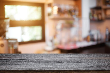 Empty desk space platform over blurred restaurant or coffee shop background for product display montage.