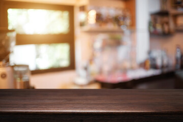 Empty desk space platform over blurred restaurant or coffee shop background for product display montage.