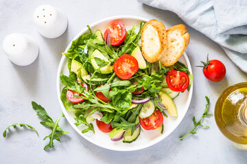 Green salad from leaves and vegetables.