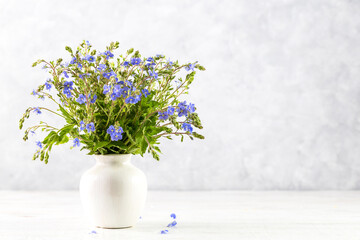 Image with blue flowers.