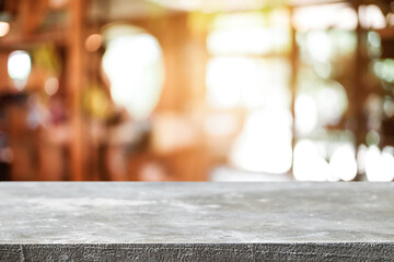 Empty wooden table space platform and blurred resturant or coffee shop background for product display montage.