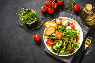 Green salad from leaves and vegetables.