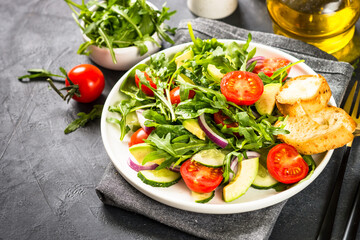 Green salad from leaves and vegetables.