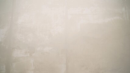 White and Gray cement wall background or texture. The camera zoom out