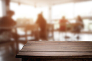 Empty wooden table space platform and blurred resturant or coffee shop background for product display montage.