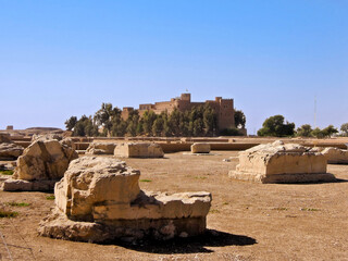Panoramic view onto remains of King Darius Palace in Susa, & fortress of Frech archeologists. Ruins...