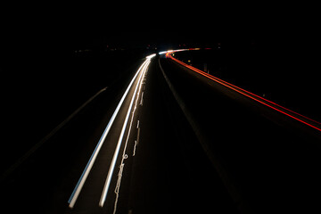 light trails on highway at night, long exposure photo