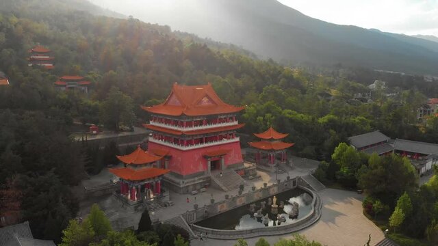 Ancient City of Dali, China. Drone Aerial View of Main Gate of Chongsheng Buddhist Temple Behind the Three Pagodas, Major Touristic Destination